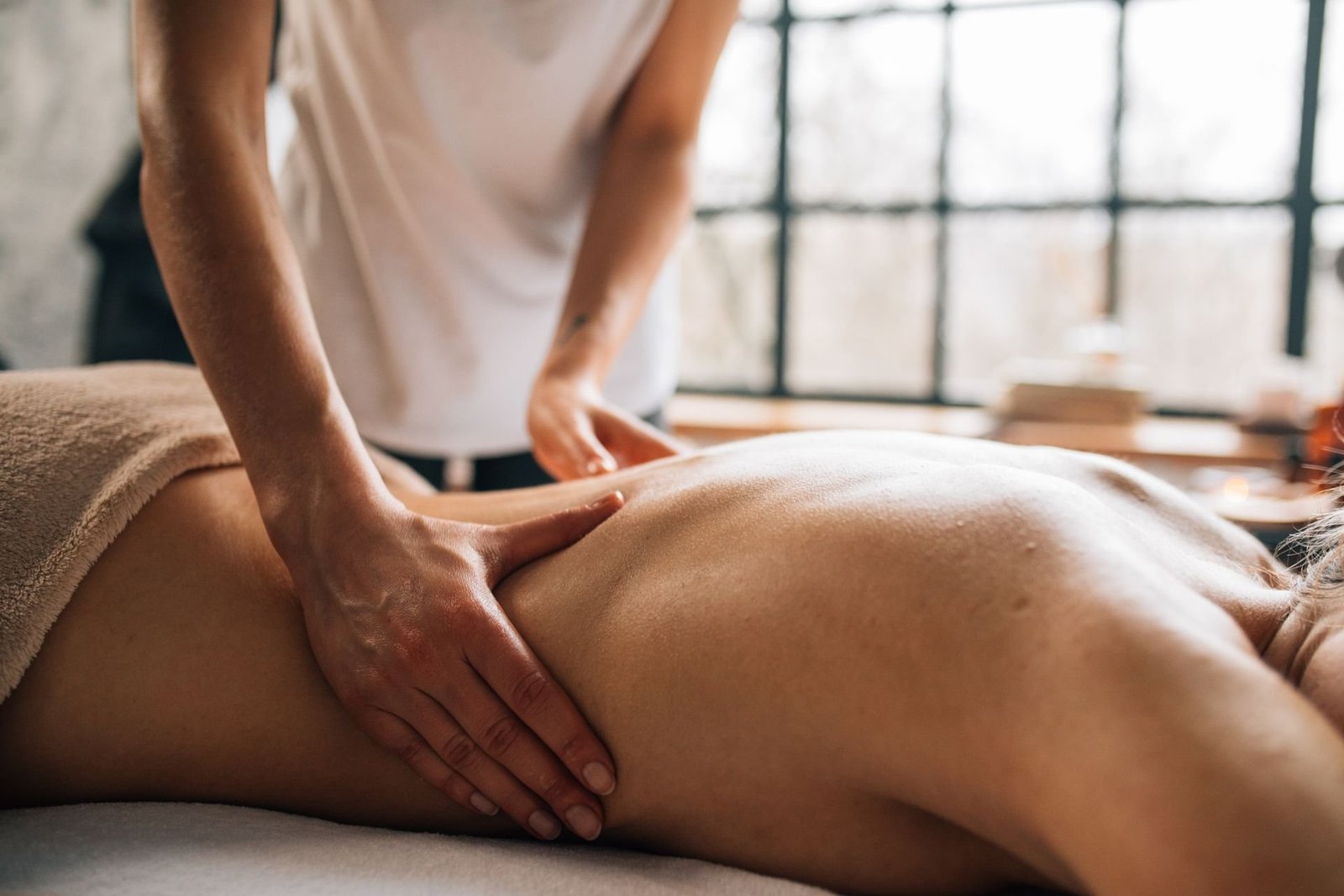 Full-body massage therapy session at Aura Beauty Care and Massage